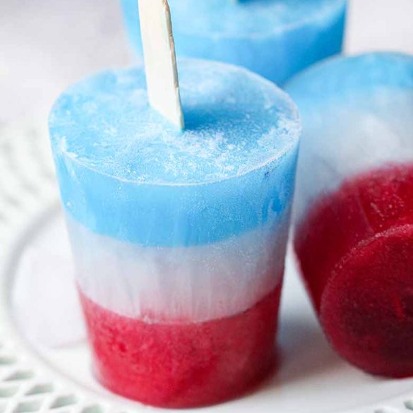 https://yummynotes.net/wp-content/uploads/2023/06/Red-White-and-Blue-Popsicles-585x585.jpg